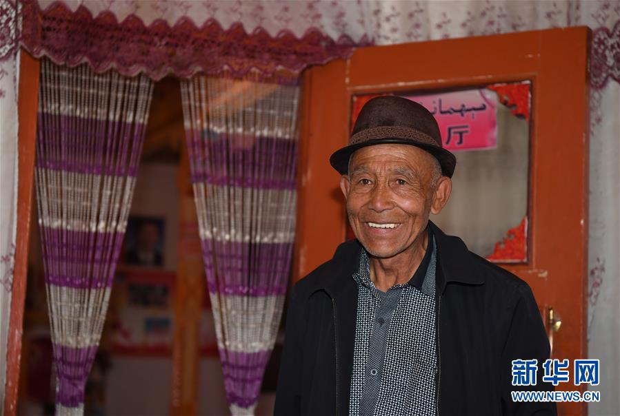 (決戰(zhàn)決勝脫貧攻堅·聚焦三區(qū)三州·圖文互動)(6)昆侖山村建起停車場