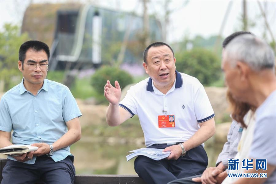 (新華全媒頭條·兩會精神看落實·圖文互動)(2)整體謀劃、系統(tǒng)升級、全面提升——落實全國兩會精神織牢織密公共衛(wèi)生防護網